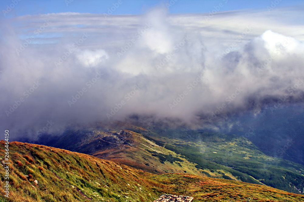 Clouds and fog over mountains