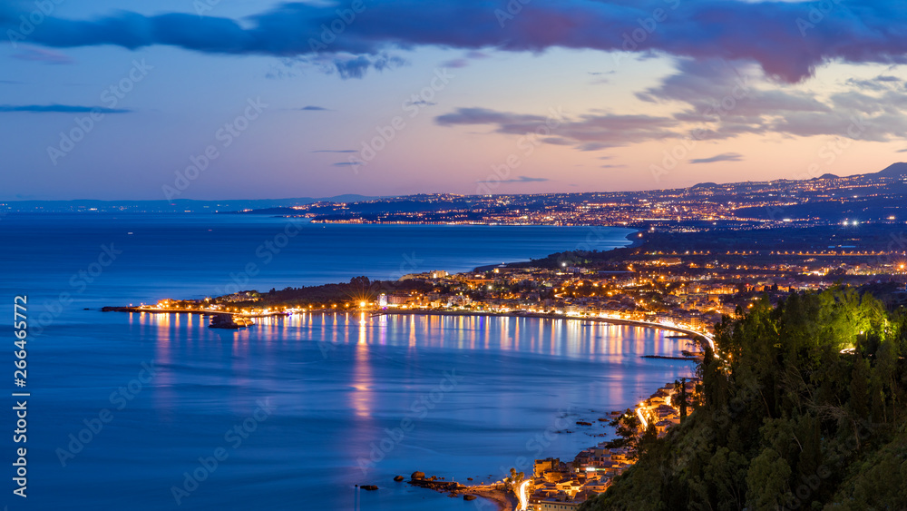 Aerial sunset view of coast of Sicily near Taormina, Italy.