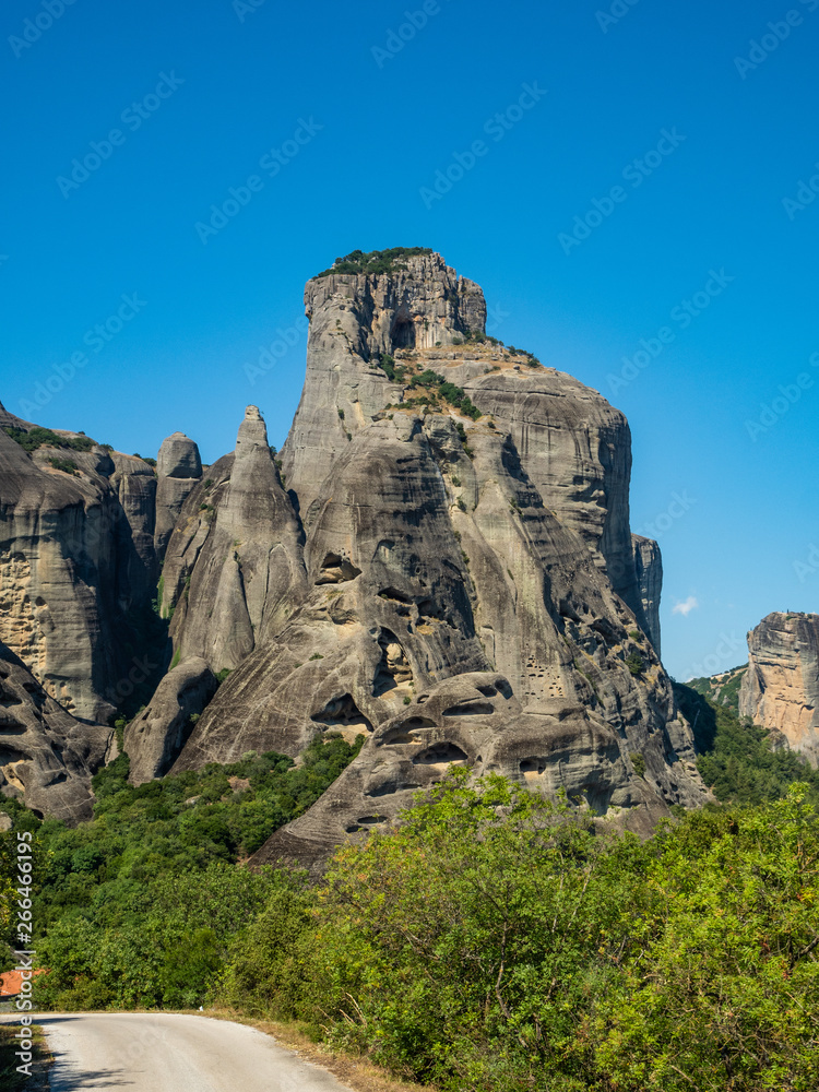 Beautiful landscape overlooking the town of Kalambaka in the valley of the river Pinyos and the rock formations in the mountains in Meteora region, Greece