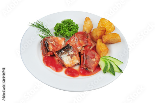 Plate with sardines tomatoes and aromatic herbs on white isolated background