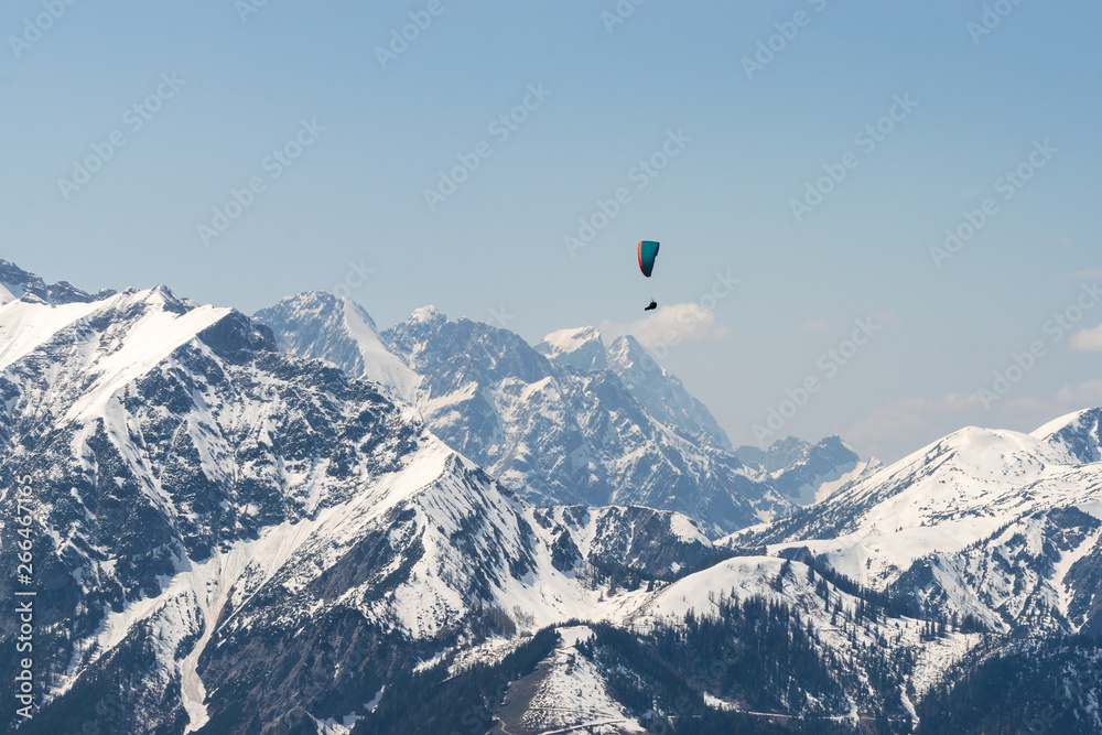 Fototapeta premium Paragliding over Alps