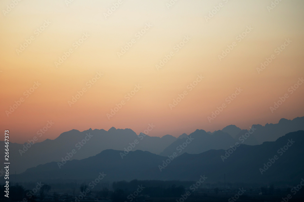 The misty peaks were at sunset