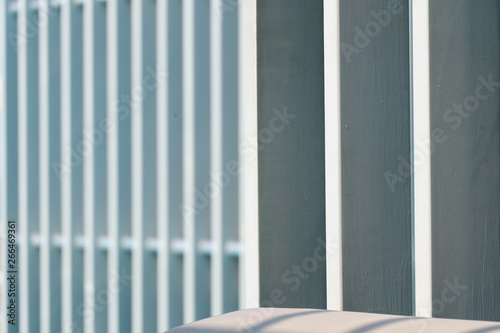 selective focus metal cage under blue sky.