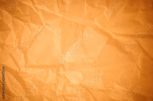 Brown crumpled paper background.