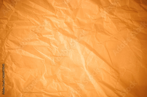 Brown crumpled paper background.