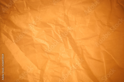 Brown crumpled paper background.