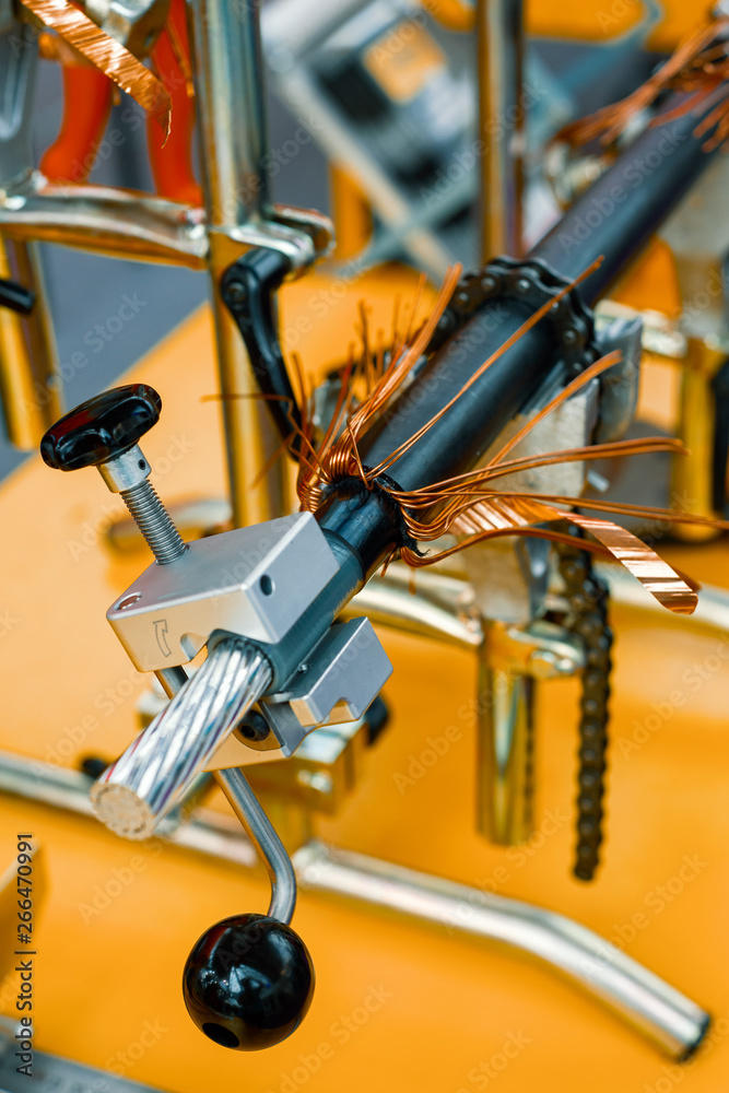 Stripping electrical cable from insulation. Stripping electrical cable from insulation.