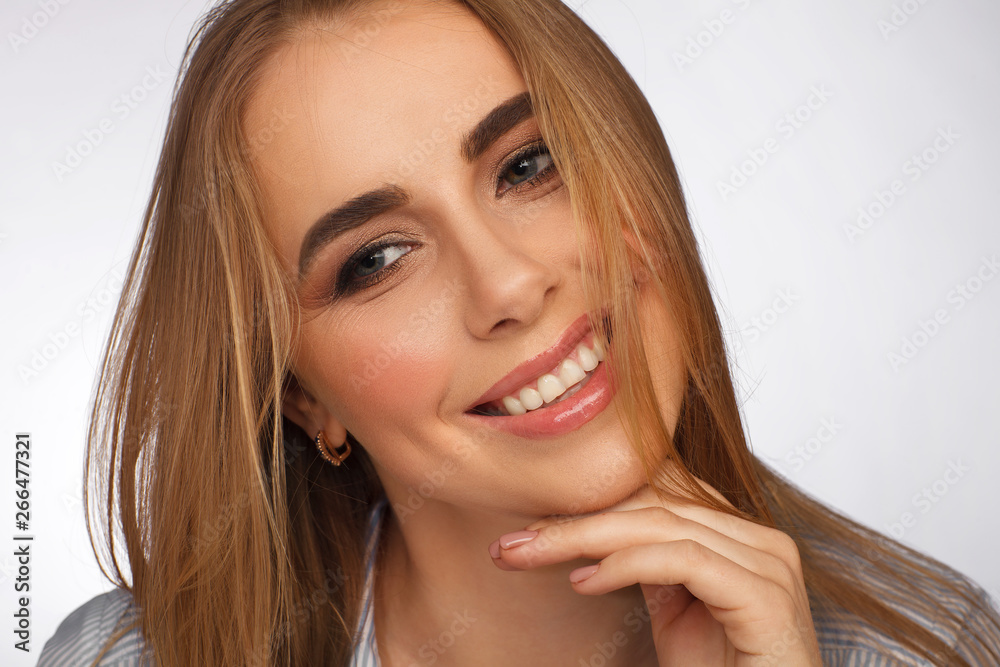 Portrait of a beautiful blonde woman. Studio photo session