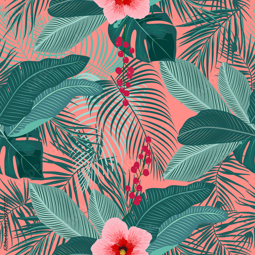 Tropical vector seamless pattern on living coral color background.