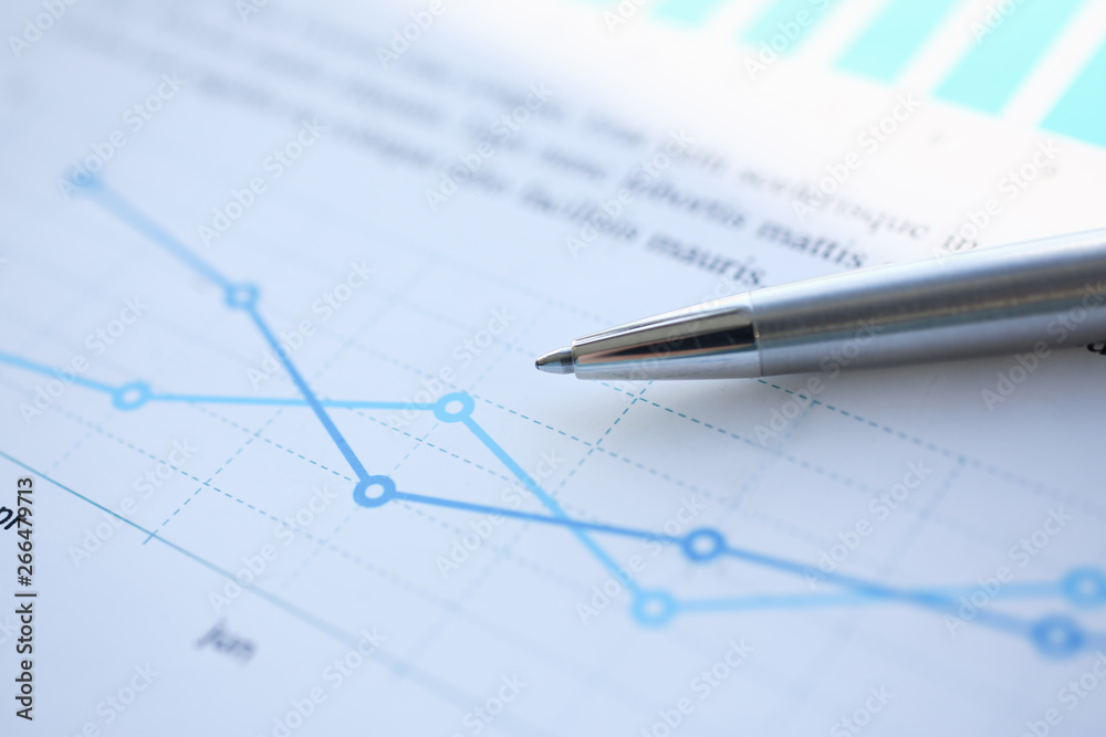 Financial statistics documents ball pen infographics at office table closeup. Internal Revenue Service inspector sum check investigation exchange market earnings savings loan and credit concept Financial statistics documents ball pen infographics at office table closeup. Internal Revenue Service inspector sum check investigation exchange market earnings savings loan and credit concept
