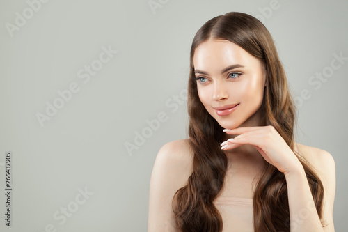 Young perfect woman spa model with clear skin and long hair portrait