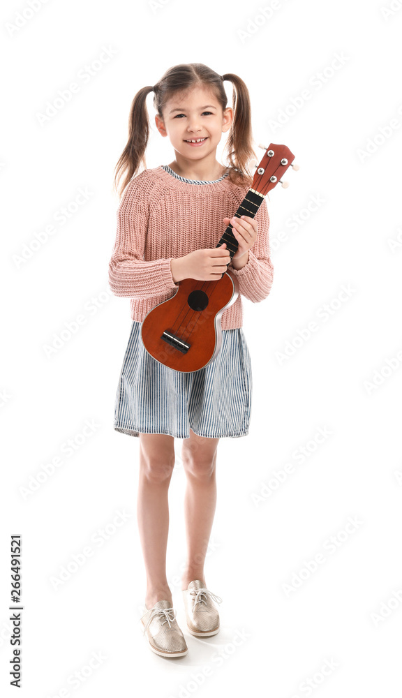 Little girl playing guitar against white background Little girl playing guitar against white background