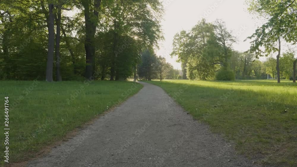 Way at sunset in park Sanssouci in Potsdam Germany Way at sunset in park Sanssouci in Potsdam Germany