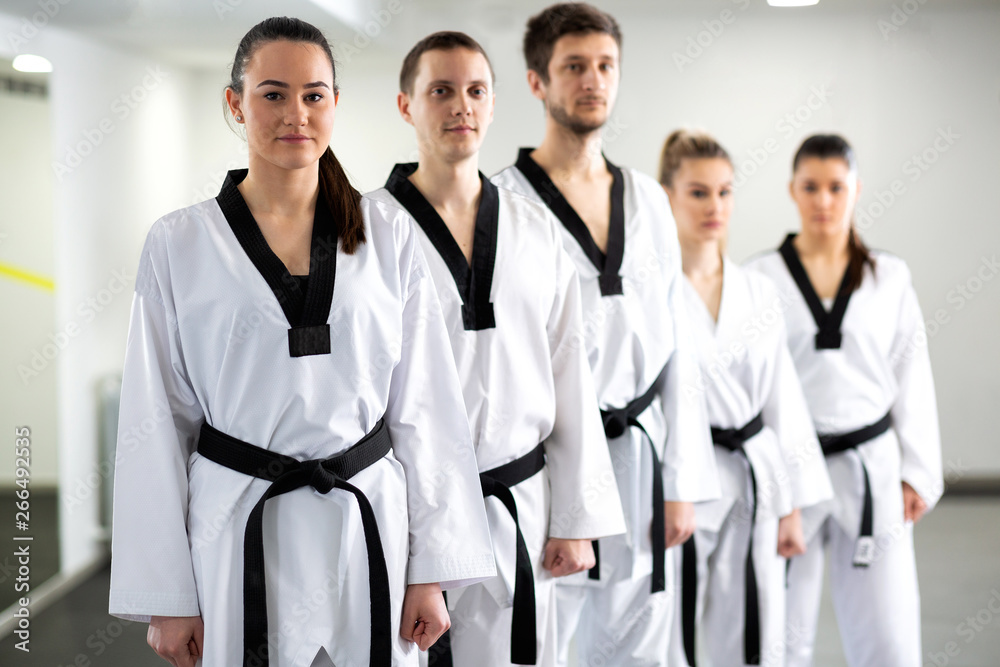 Martial arts combat fighters showing high discipline Martial arts combat fighters showing high discipline