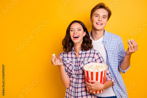 Close up photo of couple with pop corn he him his she her lady boy laughing o...