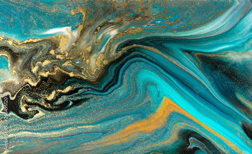 Blue marbling pattern. Golden marble liquid texture. photo