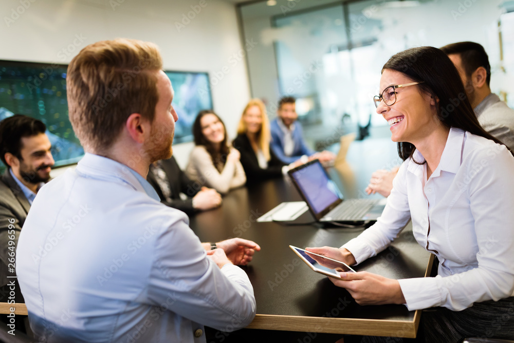 Picture of attractive businesspeople in conference room Picture of attractive businesspeople in conference room