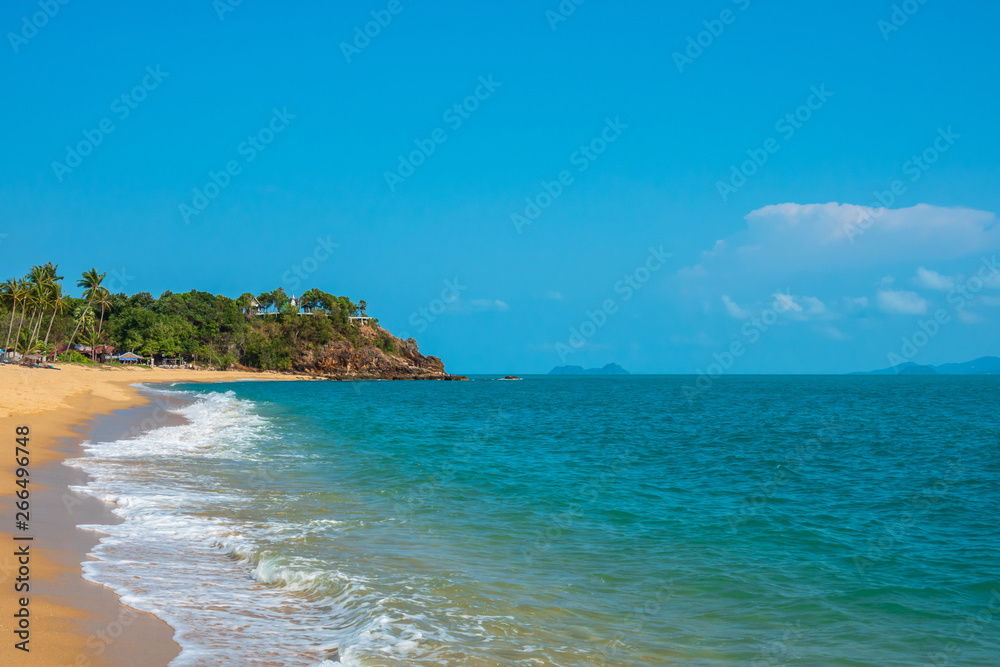Dream scene. Beautiful yellow sand beach, the tropical sea . Summer view of nature.