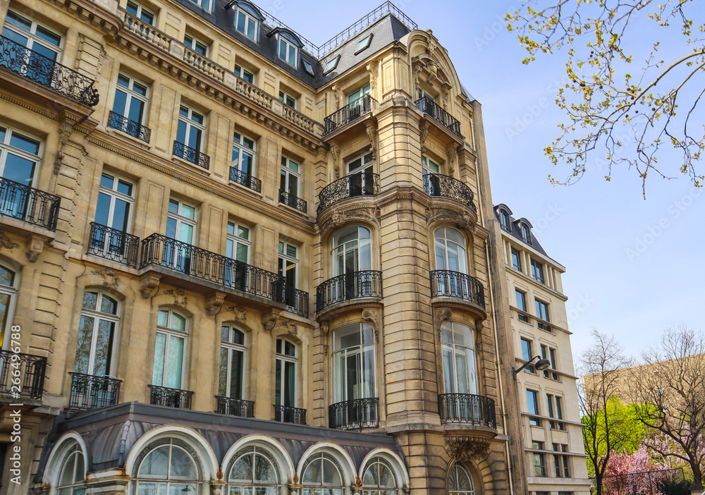 Architecture of Paris France. Facades of a traditional apartment buildings