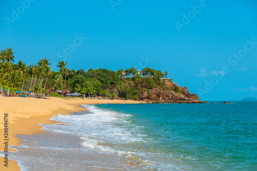 Dream scene. Beautiful yellow sand beach, the tropical sea . Summer view of nature.