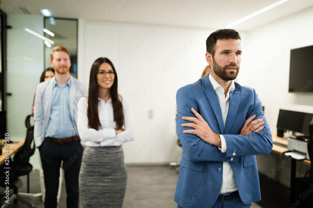 Portrait of business team posing in office Portrait of business team posing in office