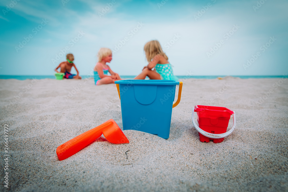 sand toys and kids playing on beach vacation sand toys and kids playing on beach vacation