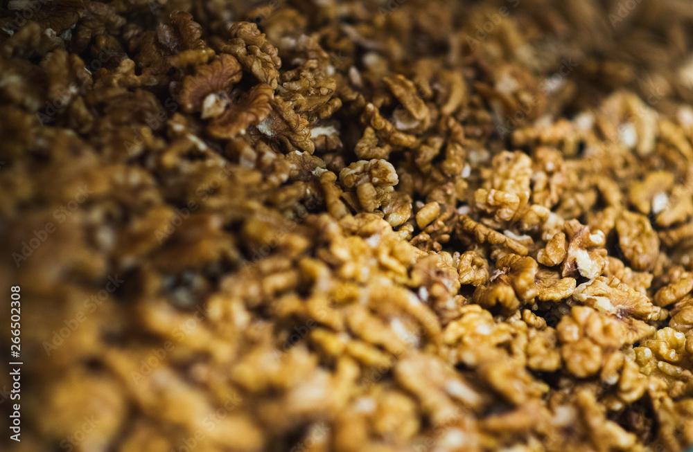 Walnut without shell on the counter of the grocery market. Harvest nutritious nuts in the store. Walnut without shell on the counter of the grocery market. Harvest nutritious nuts in the store.