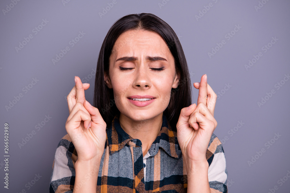 Close-up portrait of her she nice lovely sweet adorable attractive worried straight-haired lady wearing checked plaid showing crossed fingers closed eyes isolated over gray pastel background Close-up portrait of her she nice lovely sweet adorable attractive worried straight-haired lady wearing checked plaid showing crossed fingers closed eyes isolated over gray pastel background