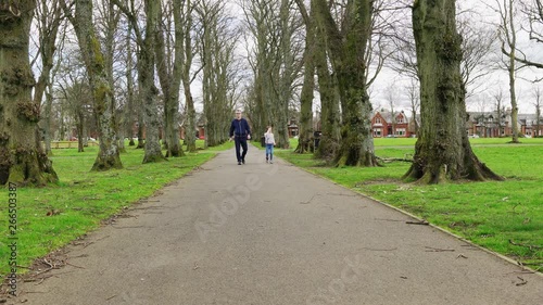 Wallpaper Mural A Dad and his little girl walking through the park Torontodigital.ca