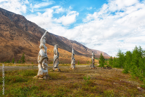 Wooden idols on the bank of the river Sob, Polar Urals, Russia photo