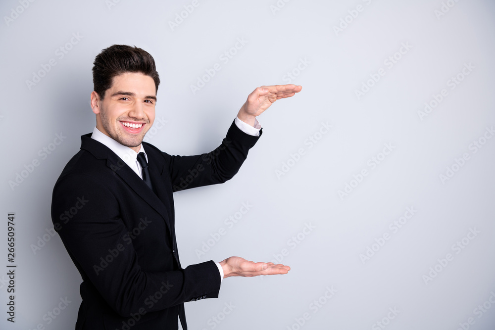 Portrait of excited satisfied representative banker enjoy stylish manager cheerful feel content glad make hand arm frame show size explain plans wear black jackets isolated on grey background Portrait of excited satisfied representative banker enjoy stylish manager cheerful feel content glad make hand arm frame show size explain plans wear black jackets isolated on grey background