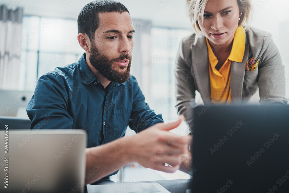 Team of coworkers making great work discussion in modern office.Business teamwork concept Team of coworkers making great work discussion in modern office.Business teamwork concept