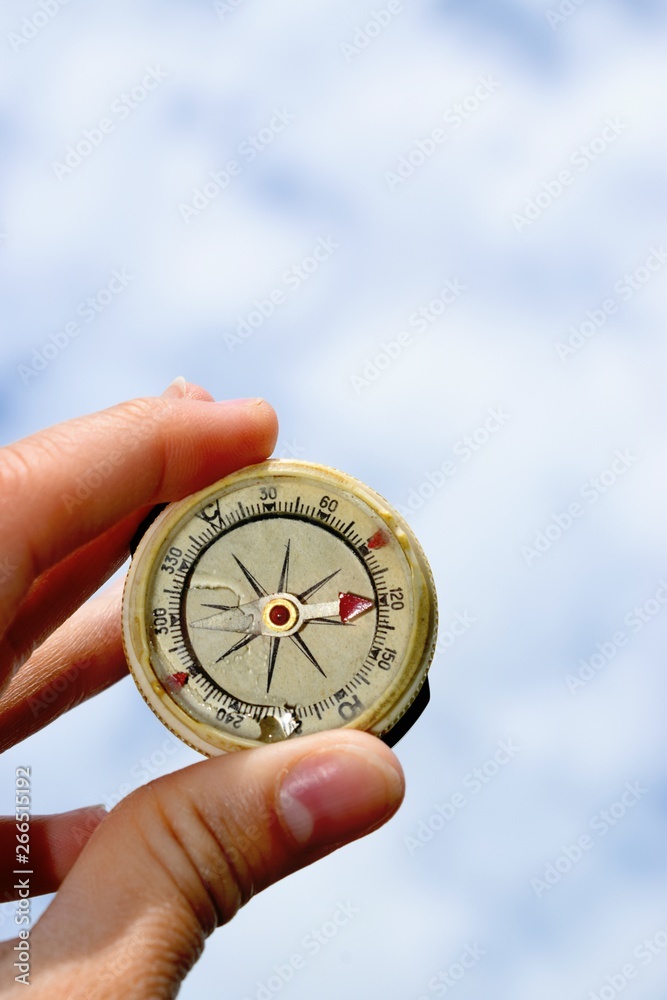 A compass is an instrument used for navigation and orientation that shows direction relative to the geographic cardinal directions A compass is an instrument used for navigation and orientation that shows direction relative to the geographic cardinal directions