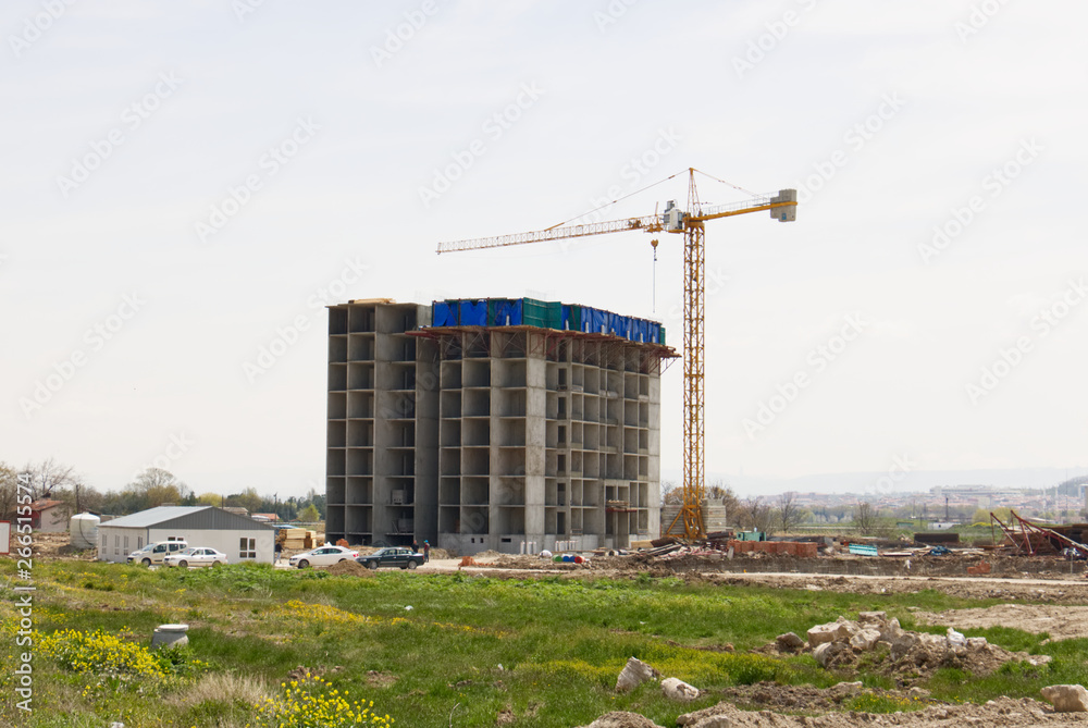 Construction of the building using a crane Construction of the building using a crane