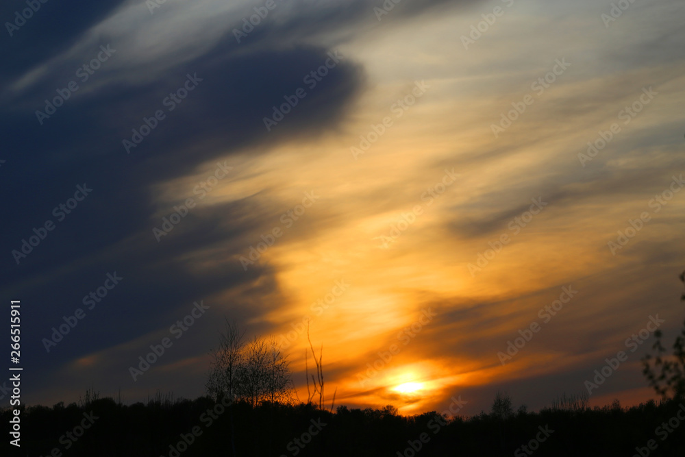 Spring evening sunset photo with clouds Spring evening sunset photo with clouds