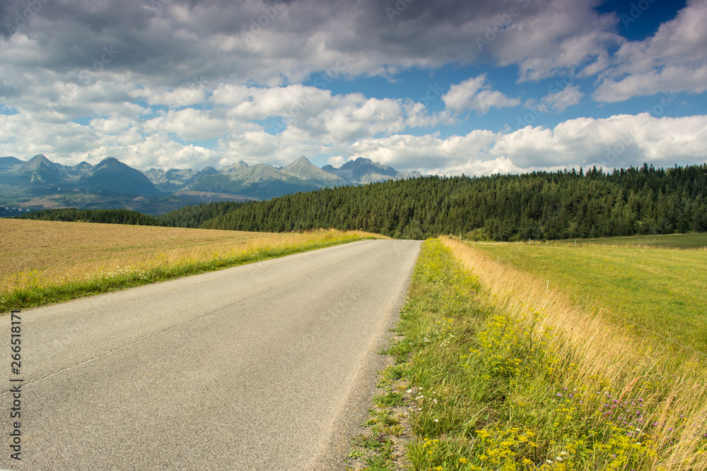 Summer scenic view of mountains and road in High Tatras