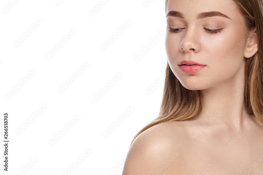 Girl with perfect skin, bare shoulders looking away, posing. Girl with perfect skin, bare shoulders looking away, posing.