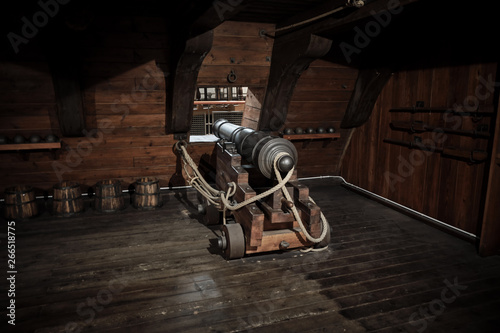 interior view of Cannons At The Deck and Cannon Balls plus windows on old galleon with rope