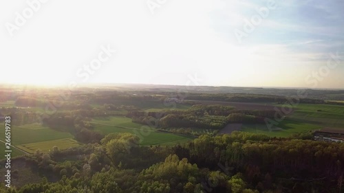 Aerial, beautiful view of a forest and some fields