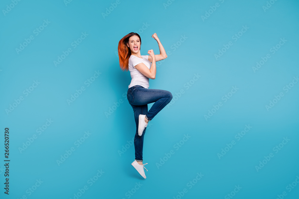Full length body size profile side view portrait of her she nice attractive cheerful cheery ecstatic girl wearing white tshirt celebrate attainment isolated over bright vivid shine blue background