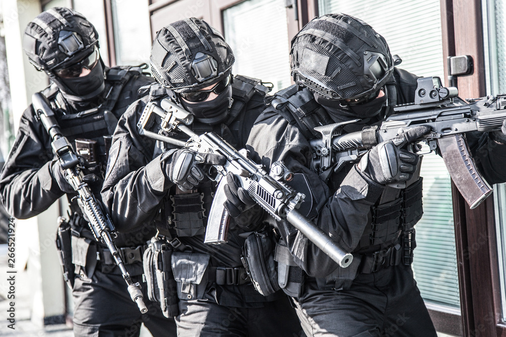 Police counter terrorist team squad storming building