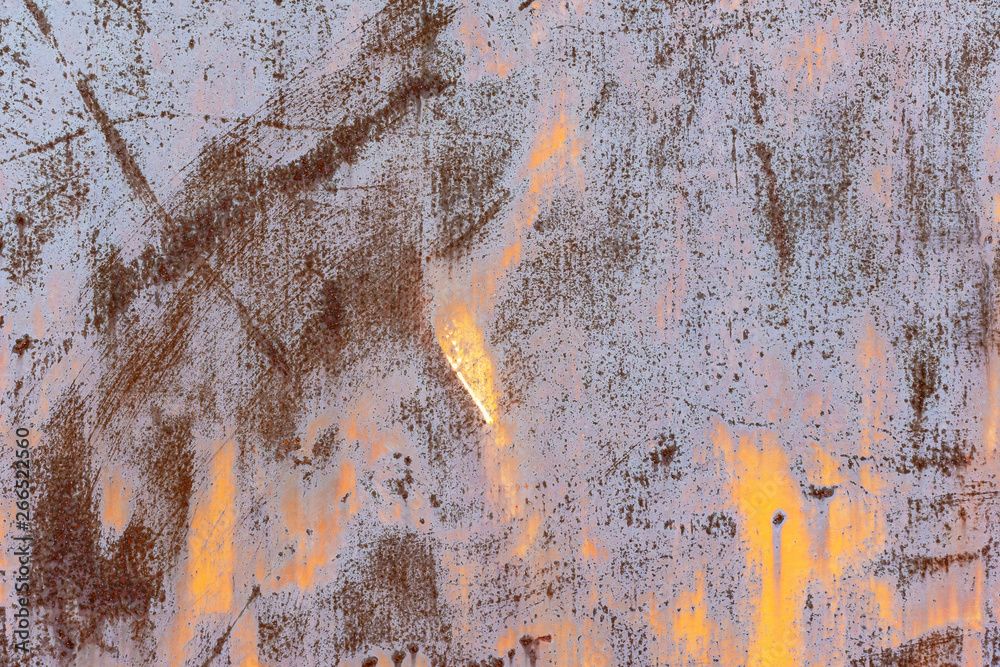 Old metal with abstract orange and purple tones
