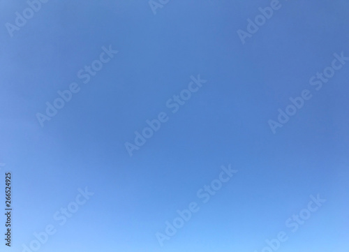 Photo of blue sky. Heavenly background. Spring in the village.