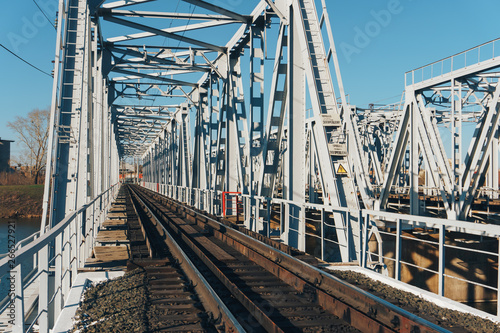 railway bridge over the river in summer weather