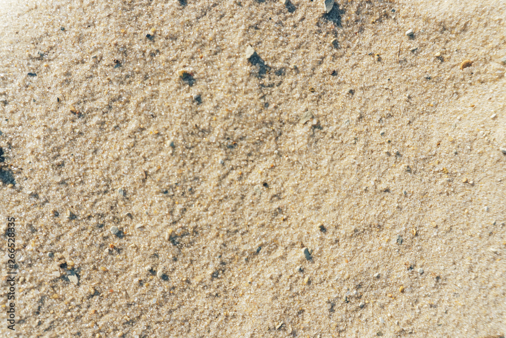 Abstract background of a sandy beach close-up in defocus Abstract background of a sandy beach close-up in defocus