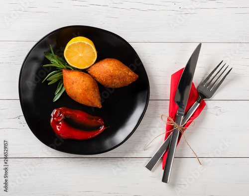 Kibbeh,stuffed meatballs photo