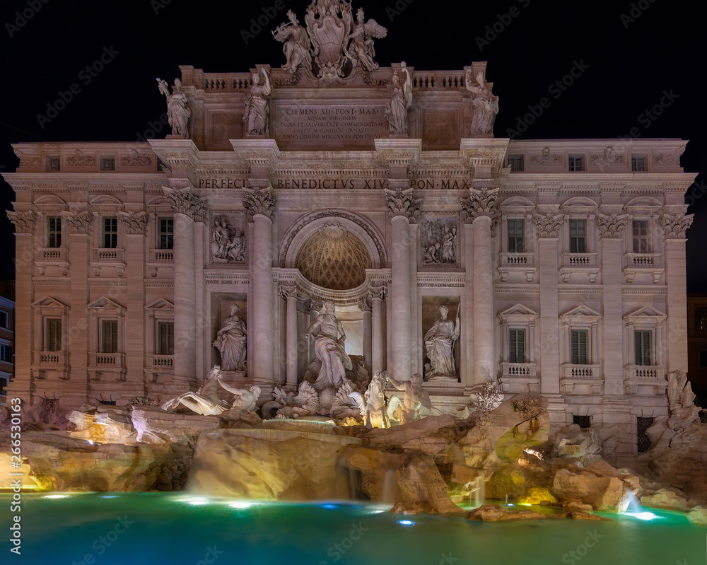 Night view of Rome Trevi Fountain (Fontana di Trevi) in Rome, Italy. Trevi is most famous fountain of Rome. Architecture and landmark of Rome,