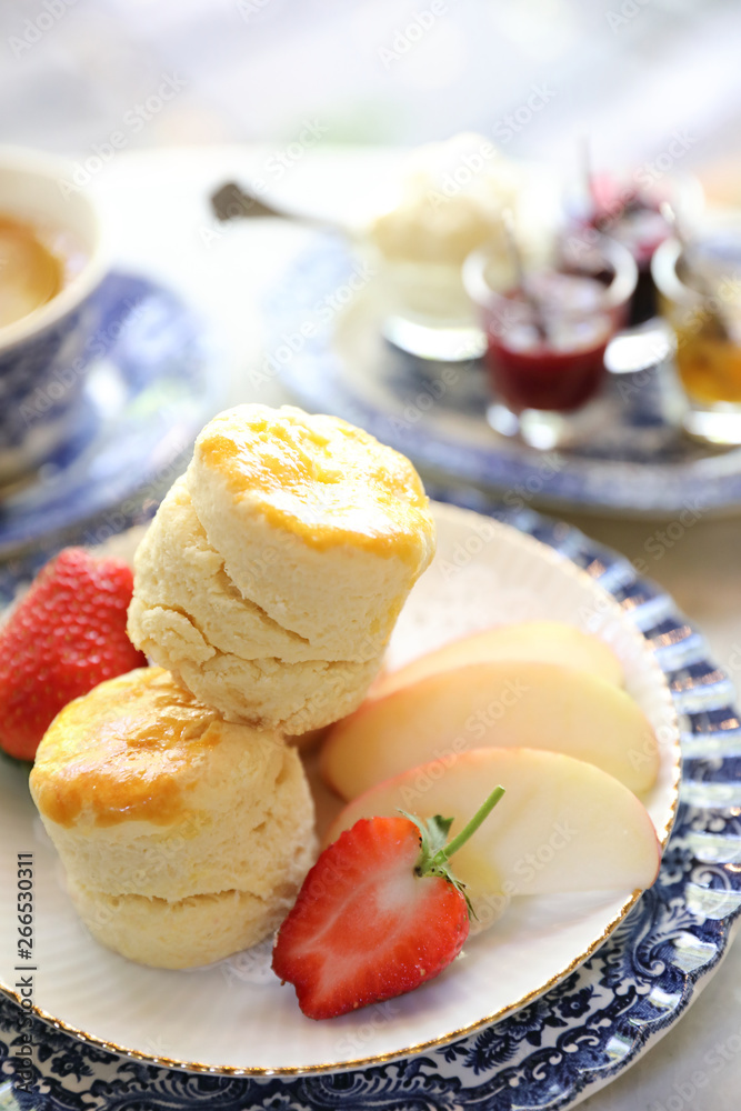 Scones with jam and tea english baked dessert Scones with jam and tea english baked dessert