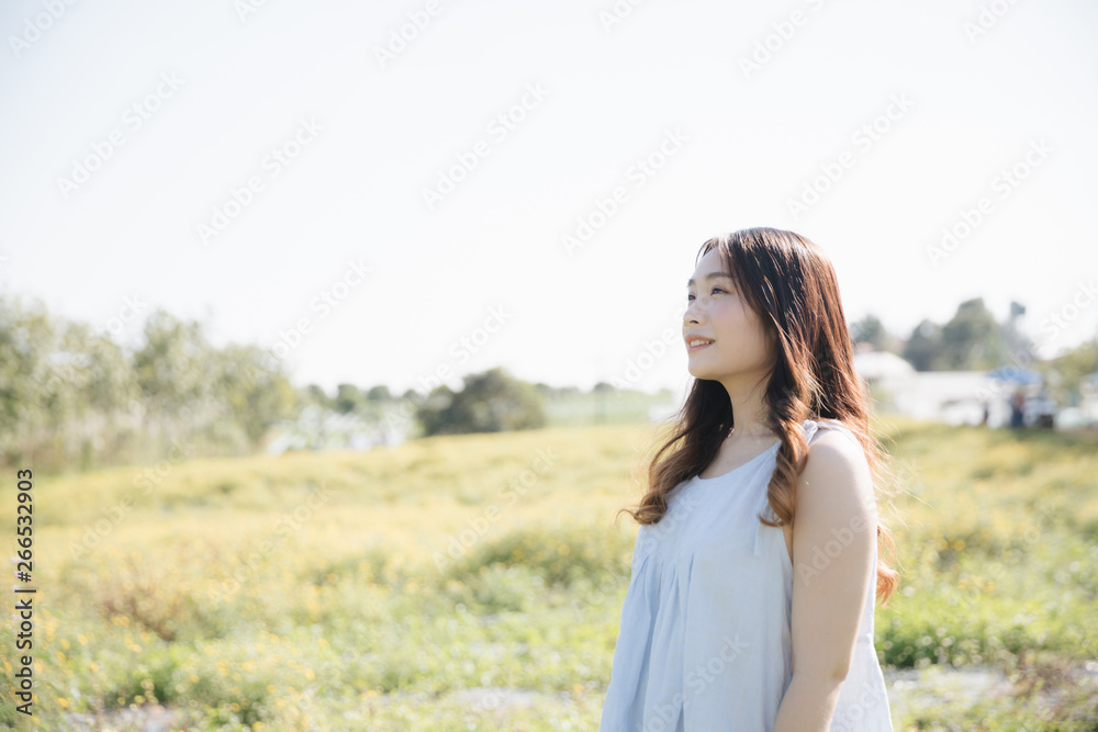 Portrait of Young Asian woman girl smile in flower garden Portrait of Young Asian woman girl smile in flower garden