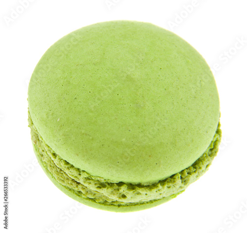 Green macaroon isolated on white background close up